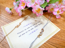 Load image into Gallery viewer, Emily Bronte quote with two bracelets: one saying love, another one with heart and sign for infinite