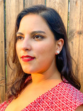 Load image into Gallery viewer, Woman wearing knot earrings
