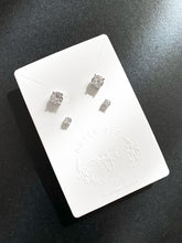 Load image into Gallery viewer, Jewelry card with two sets of white zirconia stud earrings; card says: Patty Bee Shop
