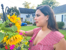 Load image into Gallery viewer, Woman wearing laurel earrings outside looking at sunflowers
